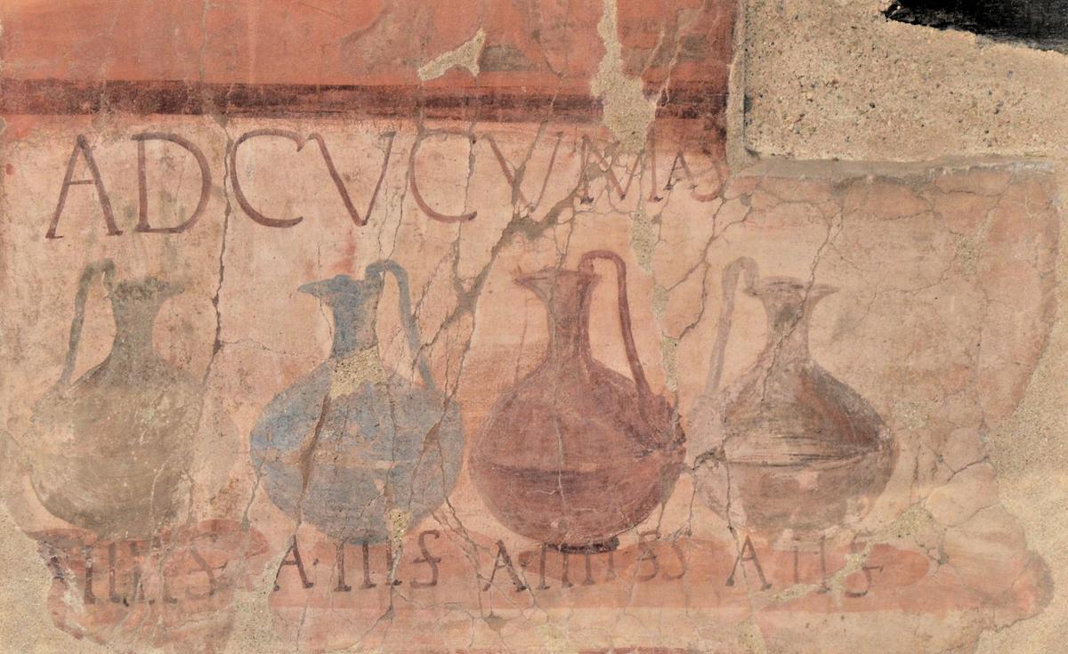 Wine selling advertisement and prices, “Ad Cucumas” shop, ancient roman painting, Herculaneum, Italy.