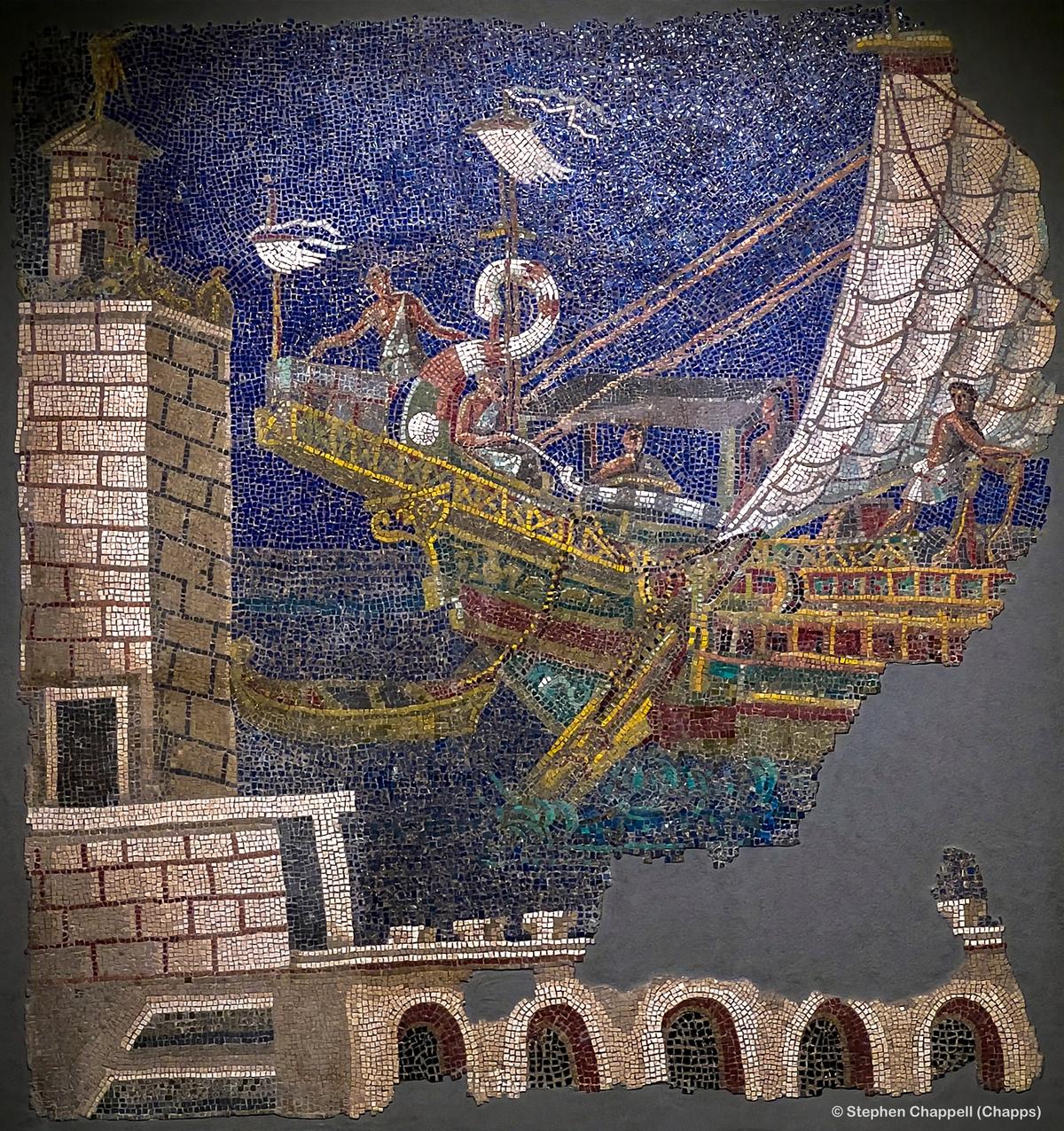 Wall mosaic with a Roman ship, depicting the port and the great Pharos (lighthouse) of Alexandria.
